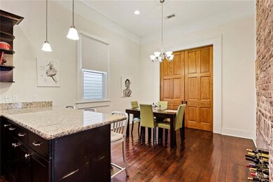 Dining.  Cypress sliding doors open to bedroom #3.