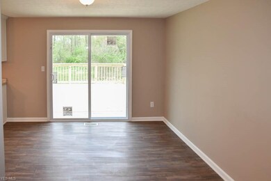 Dining room with sliding doors to the back deck.