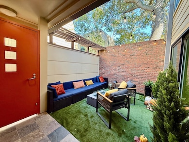 View of patio with outdoor lounge area