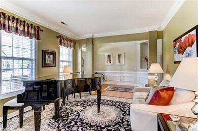 Wainscot Molded Foyer Opens to Living Room with Wo