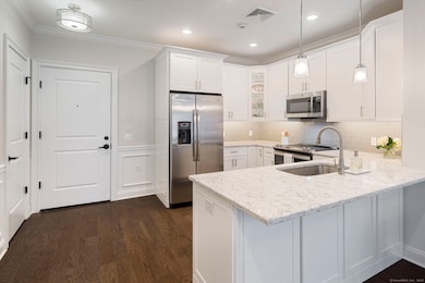Kitchen with counter space for stools