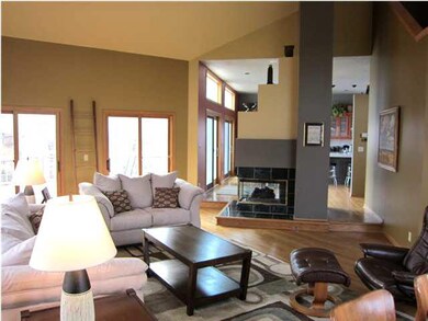 Great room with fireplace, hardwood floor
