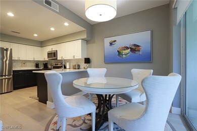 Dining space featuring light wood-style floors and recessed lighting