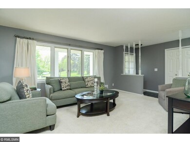 Spacious living room has plenty of natural light