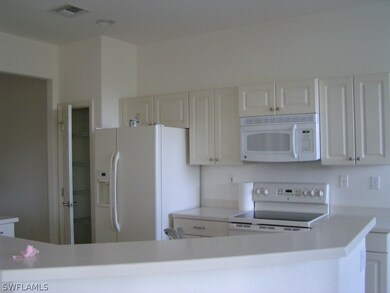 12858 Carrington Cir unit 103, Naples, FL 34105 - photo 5