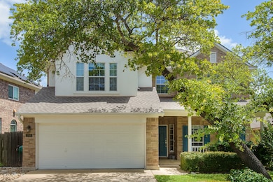 Charming two-story home with a welcoming facade, n