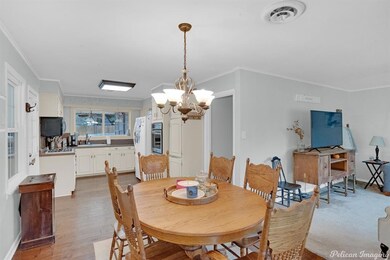 Dining area opens to the kitchen and family room