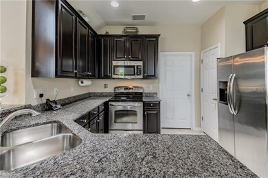 Another view of the kitchen. The pantry is the doo