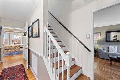 Foyer entry area featuring hardwood floors