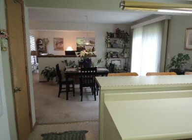 View. View from the kitchen through to the family 