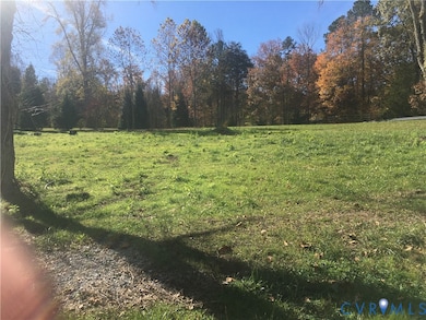 LOOKING UP FR CREEK TO POSSIBLE BUILDING SITE