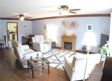 Large front living room with hardwood flooring.