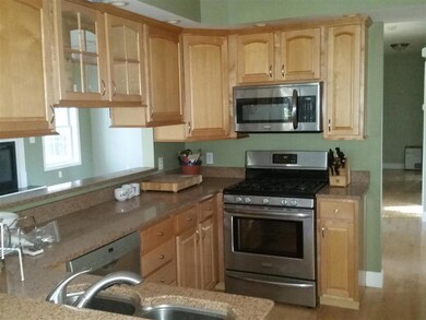 solid surface counters and stainless appliances