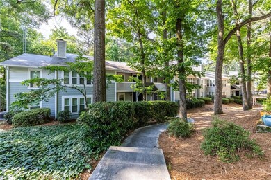 Multi unit property featuring a chimney and a residential view