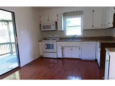 Eat-in Kitchen, Wood Flooring, White Cabinetry, Wh