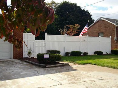 Exterior Front. LARGE LEVEL FENCED YARD
