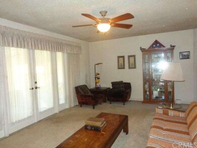 Large living room, with French doors that open to 
