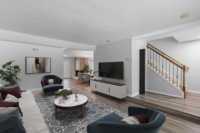 Your modern living room boasts an open and airy de