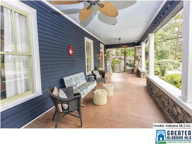 Amazing Front Porch with detailed and stone stacke