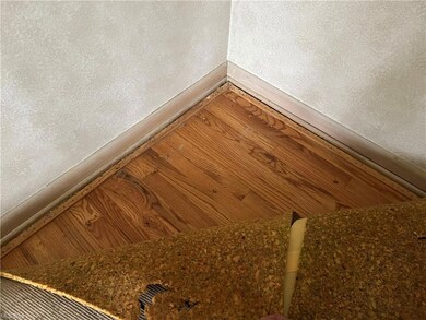 Hardwood Floor under the carpet in the Living Room