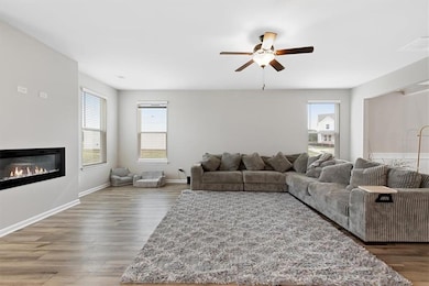 Living room featuring dark hardwood / wood-style f