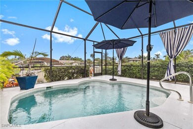 Outdoor pool with screen enclosure and lanai