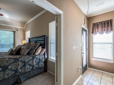 Master bedroom is tucked in behind family room. La