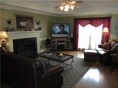Beautiful wide molding and gas log fireplace in hu