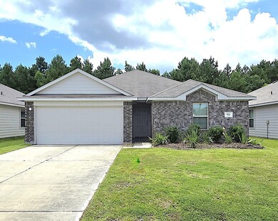Charming brick-front home with a spacious two-car