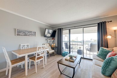 The NATURALLY LIGHTED living room that opens up to