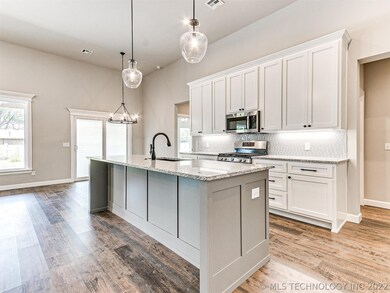 Open Kitchen w/ 3 cm Granite.