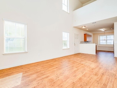 Unfurnished living room featuring light wood-styl