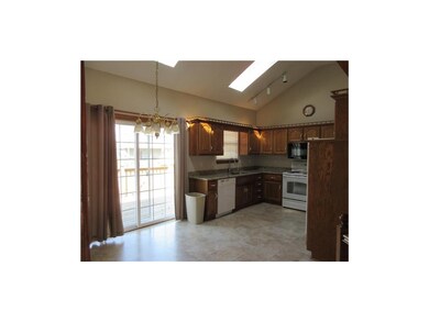 Pella sliding door leads to the 10x18 deck.