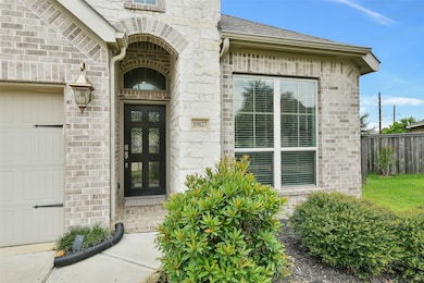 Bricked front porch and arched entry