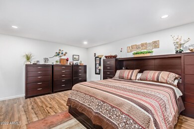 Large master bedroom with exit