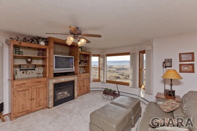 Beautiful cabinetry surrounds the gas log fireplac