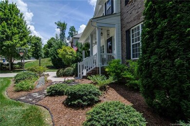 Side view of front of home. Basketball hoop stays!