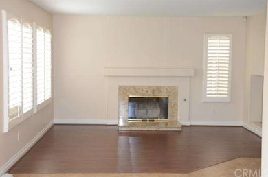 Custom shutters and fab fireplace in great room