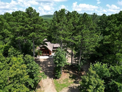 View of subject property featuring a forest