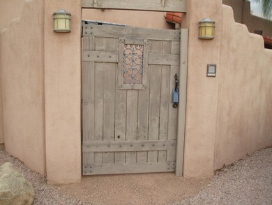 Wooden Santa Fe Gate to courtyard