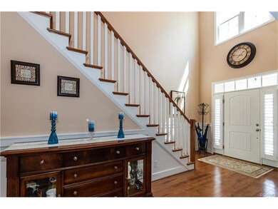Oak stairs lead to the 2nd Floor Living space