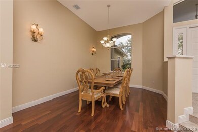 Formal dining room can comfortably accommodate tab