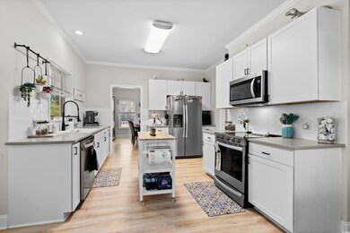 Kitchen featuring sink, stainless steel appliances