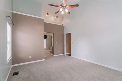 The master suite is complimented with new carpet, 