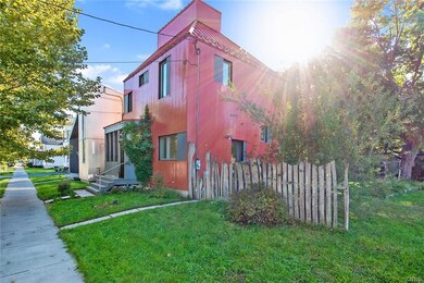 This striking home is designed with steel siding a