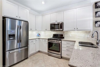 Quartz countertops, solid wood cabinetry, tile bac