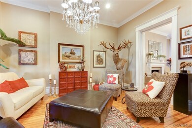 Living Room opens to Foyer and Dining Room.
