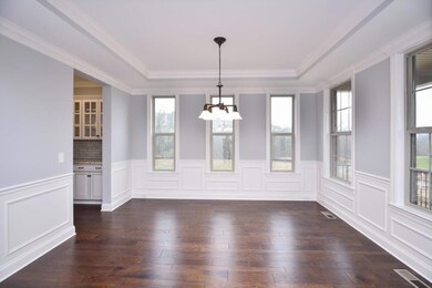 Dining Room.  Photos are from a different Community Model but Similar Floor-plan.