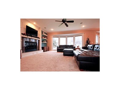 Living room with gas fireplace.