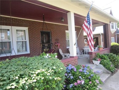 You will love sitting on this front porch having y